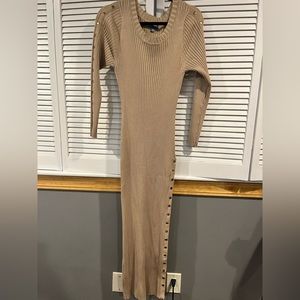 Size 2X. Tan with gold buttons. Buttons unsnap along leg. Great condition.